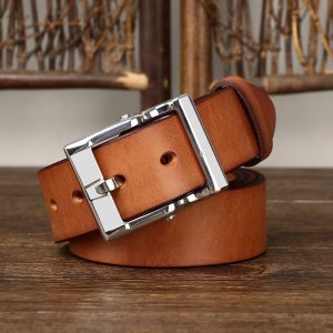 Genuine leather belt with a shiny silver buckle, stylish and durable accessory for men or women. Perfect for dressing up or casual wear, adding a touch of elegance to your outfit.