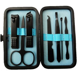Surgical nail and cuticle care kit with multiple precision tools in a compact case for manicure and pedicure hygiene.