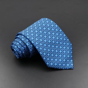 Bold blue patterned men's silk tie with geometric design, suitable for formal occasions and business attire. Perfect accessory for a professional and stylish look.