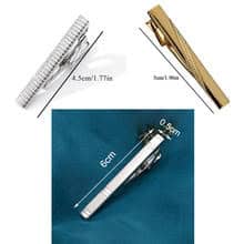 Silver and gold-colored hair clips with fine teeth and a sleek metal straightener for hair styling.