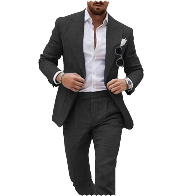Suit-wearing man adjusting blazer with sunglasses pocket square, stylish formal attire, professional look, men's fashion, business outfit, men's clothing, confident male model, modern men's style, elegant business wear, tailored suit for men.