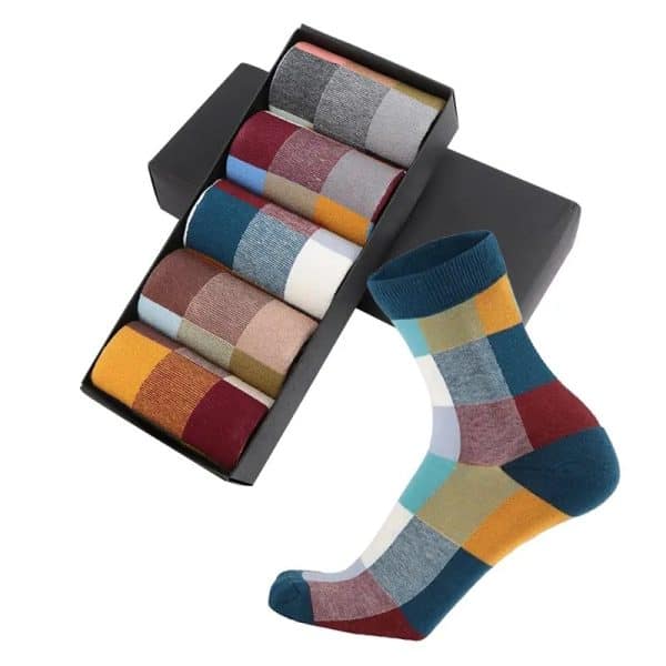 Colorful men's dress socks with a modern patchwork design, neatly arranged in a black gift box, perfect for stylish and comfortable everyday wear.