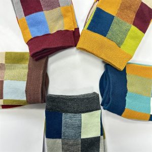 Colorful checkered socks featuring vibrant patterns and high-quality materials, perfect for casual wear and gifting. Designed for comfort and style, these socks enhance any wardrobe with their playful, eye-catching designs.
