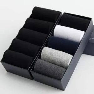 Black and gray men's dress socks set in stylish display box for professional wardrobe essentials. Perfect gift or personal purchase for formal occasions.
