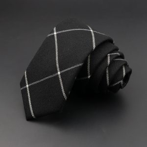 Black plaid men’s tie with white windowpane pattern, classic accessory for business and formal attire. Perfect for professional settings and stylish events. Elegant and versatile fashion choice.