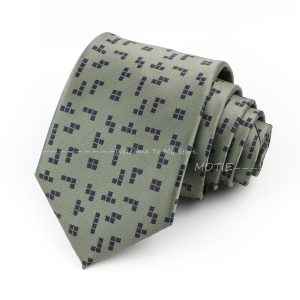 Gray tie with pixelated blue geometric pattern for formal men's fashion, ideal for business attire or special occasions.