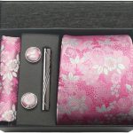 Elegant pink floral men's accessory set including tie, cufflinks, tie clip, and wallet, perfect for formal occasions and gifting.