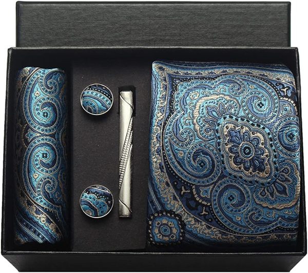 Elegant men's accessory gift set featuring a paisley silk tie, matching cufflinks, tie clip, and pocket square in blue tones for sophisticated style.
