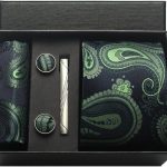 Elegant men's grooming kit in a stylish black and green paisley pattern, including cufflinks, tie clip, and pocket square, perfect for sophisticated accessories and gift sets.