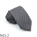 Soft gray pinstripe men's necktie, ideal for business or formal occasions, crafted from high-quality fabric for a polished, professional look.