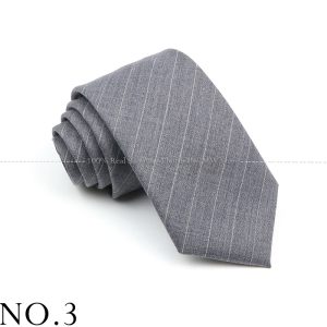 Slim-fit gray pinstripe suit tie for formal business attire, crafted from high-quality fabric, perfect for professional look and men’s fashion accessory.