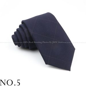 Navy blue business tie with subtle checkered pattern, ideal for formal men's attire and office wear, made from high-quality fabric for professional and elegant look.