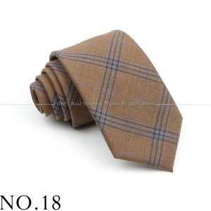 Elegant brown plaid men's necktie with classic checkered pattern, perfect for formal occasions and business attire. High-quality silk fabric ensures durability and sophisticated look.