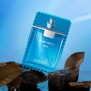 Vaporisateur de parfum Jean Miss Man, blue glass bottle display, fresh and masculine scent with elegant packaging, ideal for men’s fragrance collection.