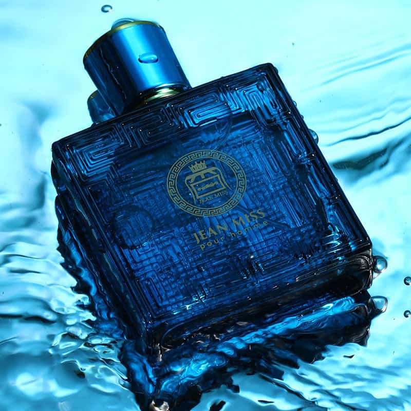Luxurious blue Jean M. Miss perfume bottle submerged in water, highlighting elegance and sophistication. Perfect for enhancing beauty and style with a luxurious fragrance.