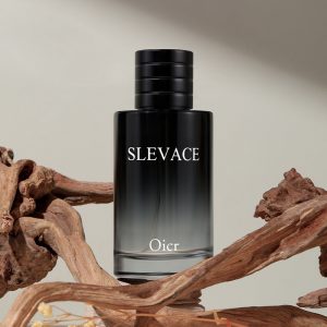 Deluxe black perfume bottle with "SLEVACE" and "Oicr" labels, surrounded by natural driftwood on a neutral background.