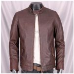 Brown leather men's jacket with zippered pockets and stand collar, stylish casual outerwear for cold weather. Perfect for modern fashion and everyday wear.