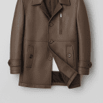 Sleek brown leather trench coat with adjustable cuff straps and multiple buttoned pockets, ideal for stylish and functional men's outerwear.