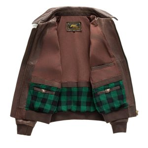 Premium brown leather jacket with stylish interior checkered lining, featuring multiple pockets and high-quality craftsmanship, perfect for men's fashion and timeless style.