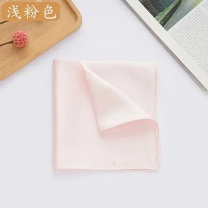 Soft pink silk fabric with smooth texture, ideal for luxury fashion and elegant accessories. Perfect for sewing, tailoring, or high-end craftsmanship projects.