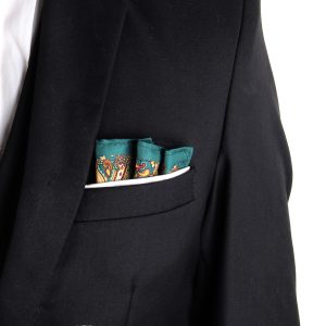 Luxurious black suit with vibrant paisley pocket square, showcasing sophisticated men's fashion and style accessories. Perfect for formal events and professional attire.