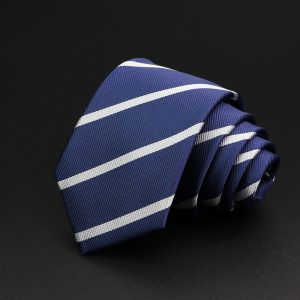 Elegant navy blue and white striped silk tie, perfect for formal occasions and business attire, showcasing high-quality craftsmanship and classic style.