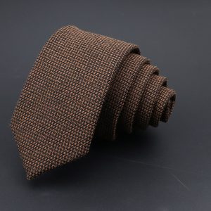 Elegant brown and black patterned men's tie, perfect for professional or formal occasions, showcasing quality craftsmanship and stylish design.