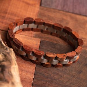 Handcrafted wooden bracelet with stainless steel accents for men and women, featuring natural wood grain and sleek design, perfect for stylish jewelry accessory.