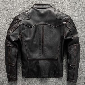 Black leather motorcycle jacket with padded elbows and quilted shoulder details, perfect for stylish protective riding gear.